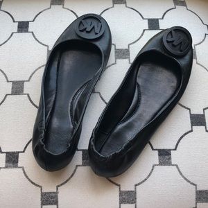 Black leather Michael Kors flats
